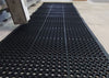 Industrial-grade, extra-large anti-fatigue mat roll with swarf-catching feature