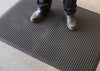 Black PremBubble ESD Anti-Fatigue Mat with bubble comfort texture for industrial use.