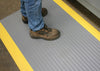 Industrial grey and yellow AtEase comfort mat for hard floors.