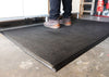 Textured industrial anti-fatigue mat for enhanced grip and durability