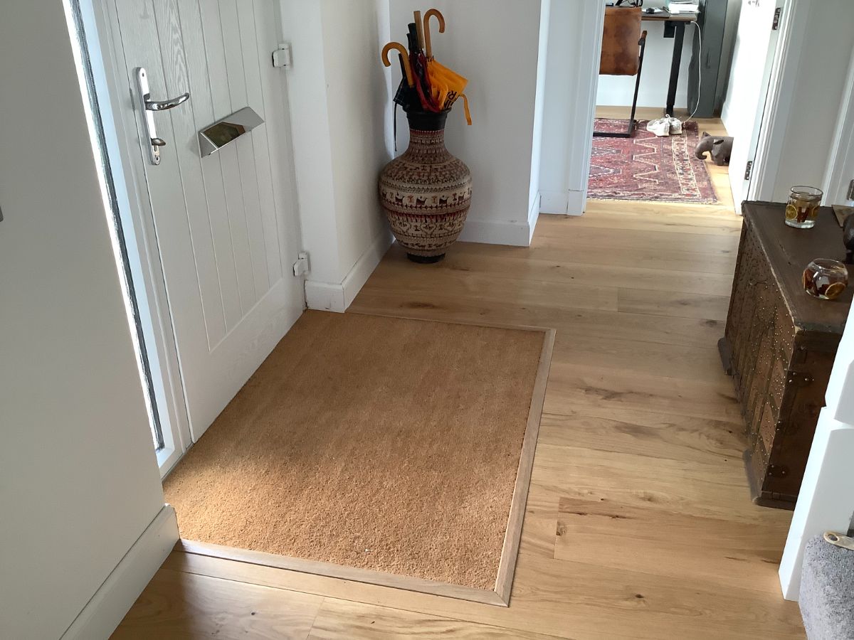 A fitted coir door mat