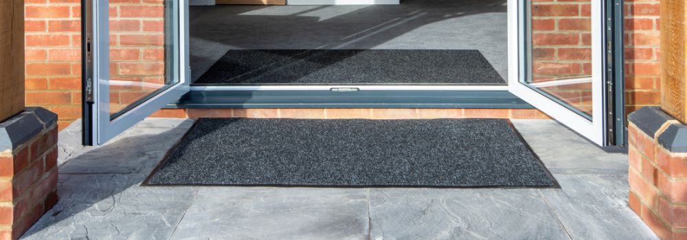 Floor mat outside a door