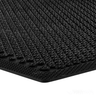 Close-up of a textured black mat with a white background