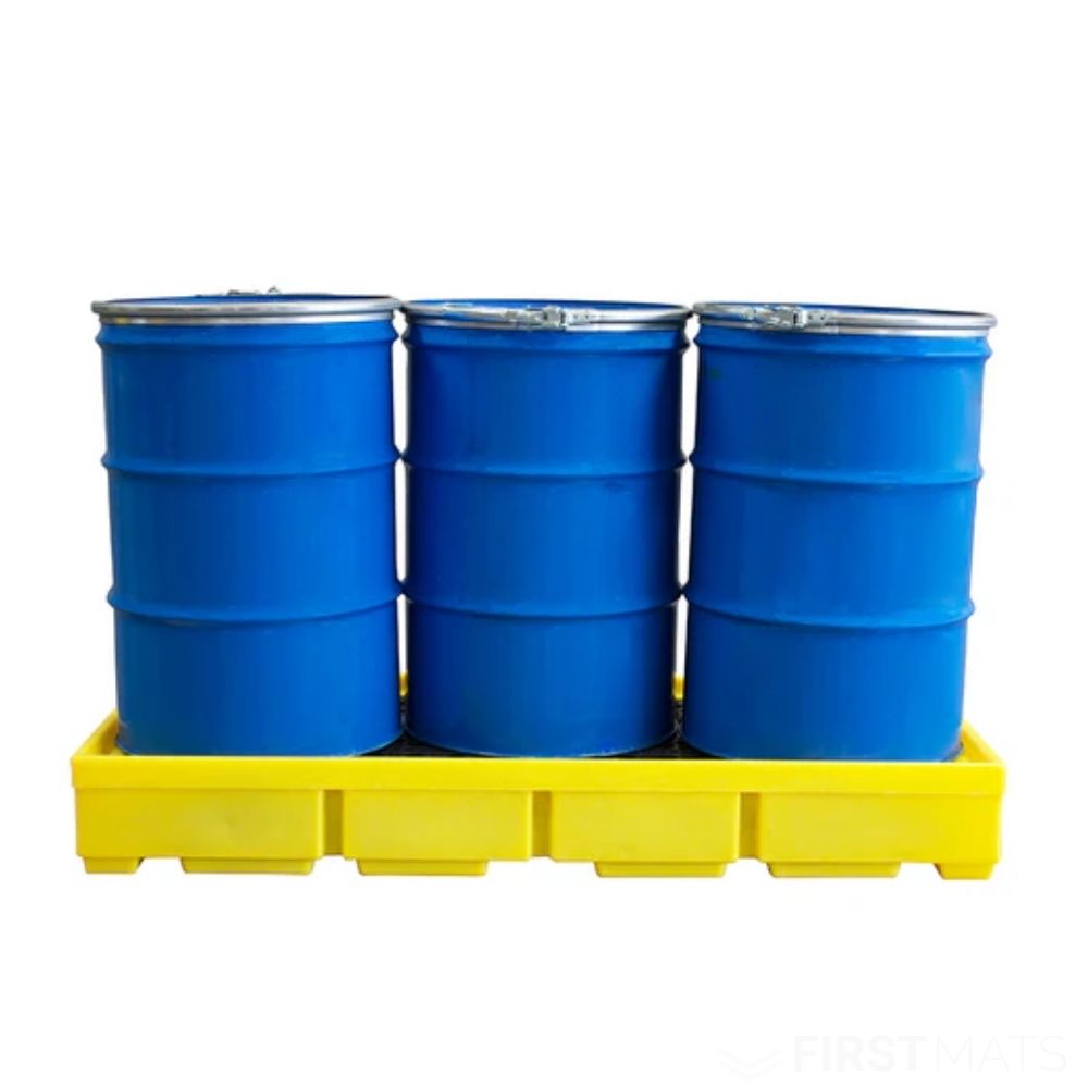 Three blue barrels on a yellow pallet against a white background