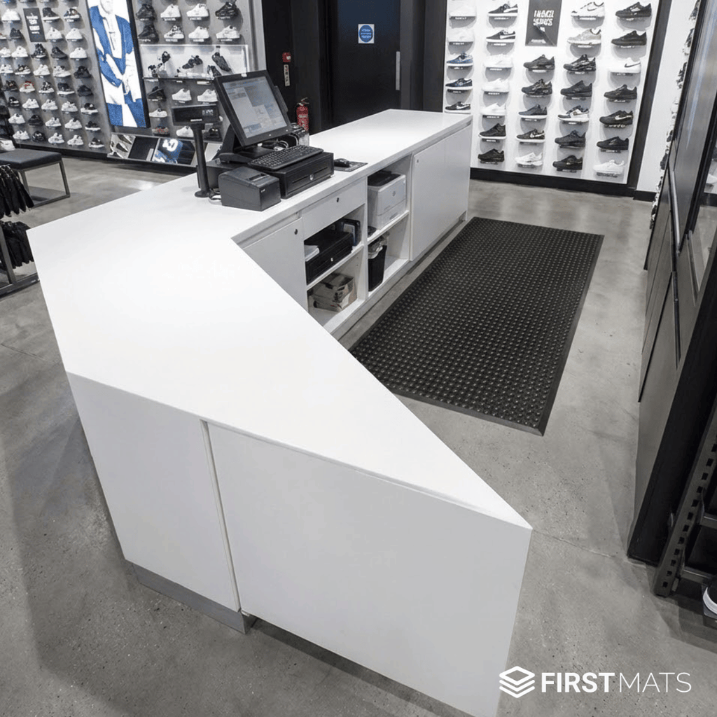 Commercial anti-fatigue mat in a sports clothing shop