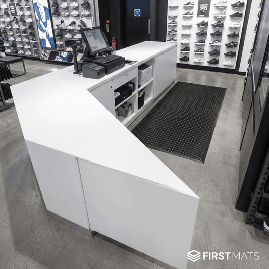 Commercial anti-fatigue mat in a sports clothing shop