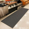 Grey made to measure mat at a food service area