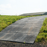 Ground Protect Tile on top of grassy bank