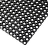 Outdoor rubber mat corner swatch showing details of hole pattern