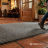 Ribbed floor mat by restaurant entrance