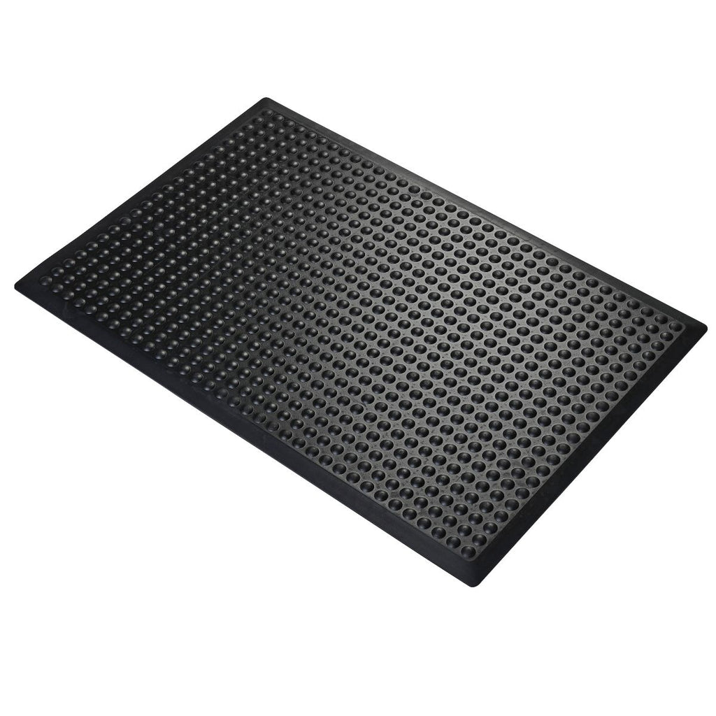 Black rubber mat with a textured surface on a white background