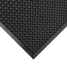 Black textured mat with a bubble pattern on a white background
