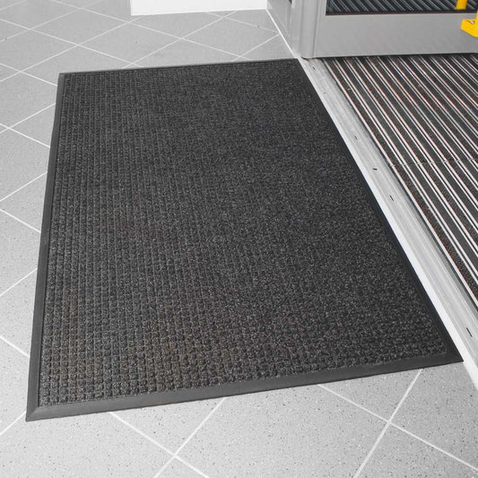 Dark grey entrance mat in a shop entrance