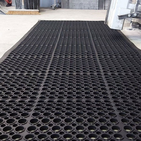 Extra-large, durable anti-fatigue mat roll designed for industrial use, with swarf-catching capabilities