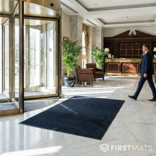 Navy blue entrance mat in a hotel lobby