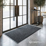 Grey door mat in a modern restaurant entrance