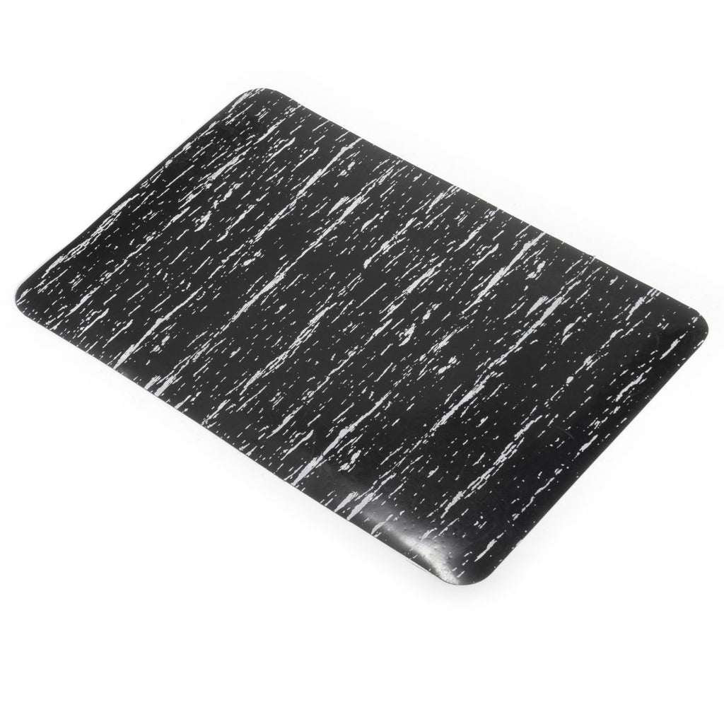 Black rectangular mat with white speckled pattern on a white background