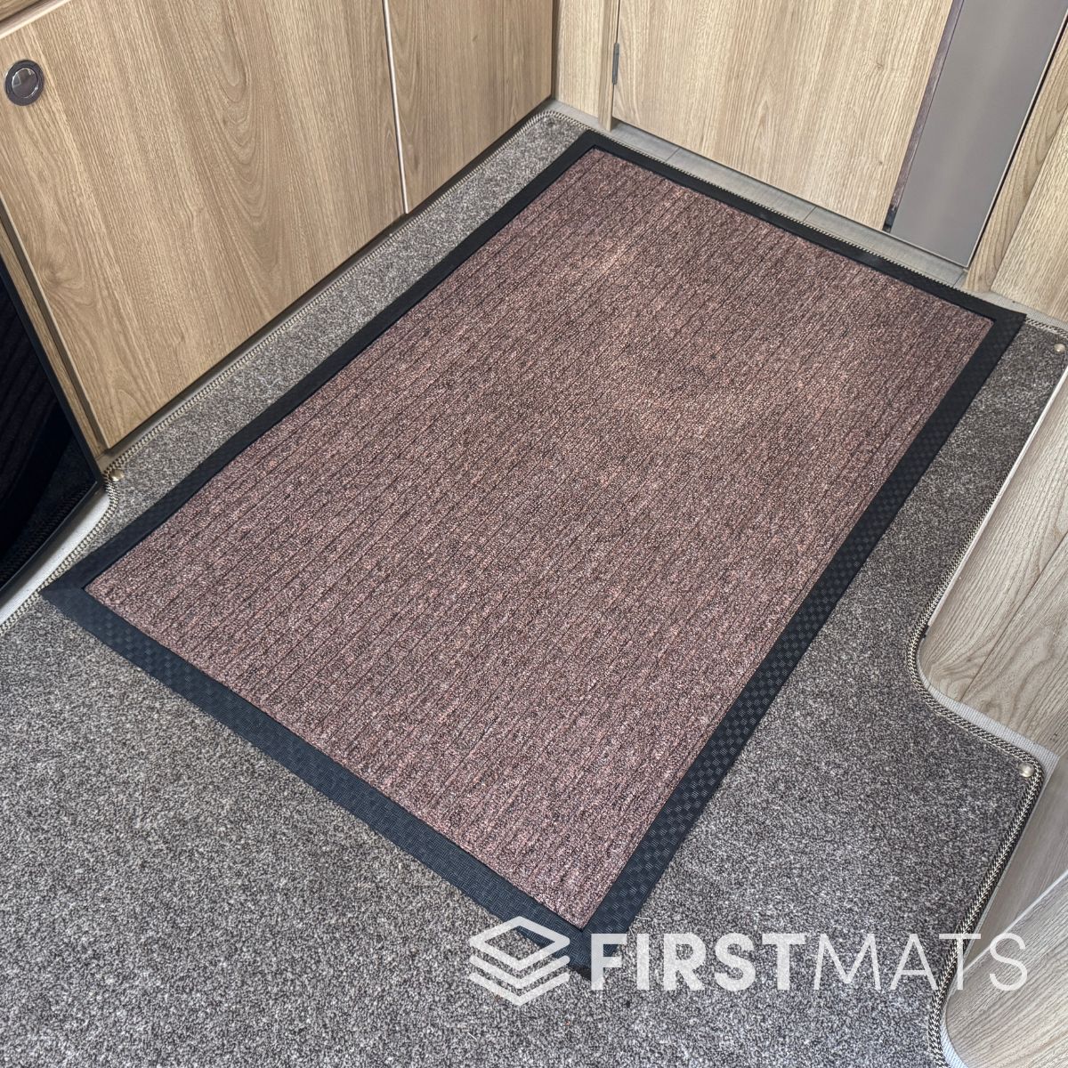 Dirt scraper mat inside a motorhome