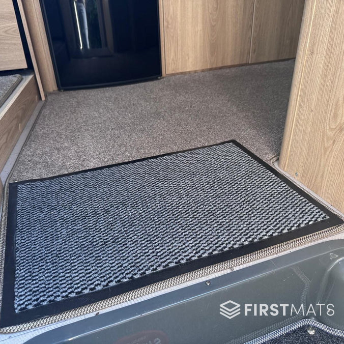 Grey thin mat in a motorhome
