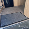 Grey thin mat in a motorhome