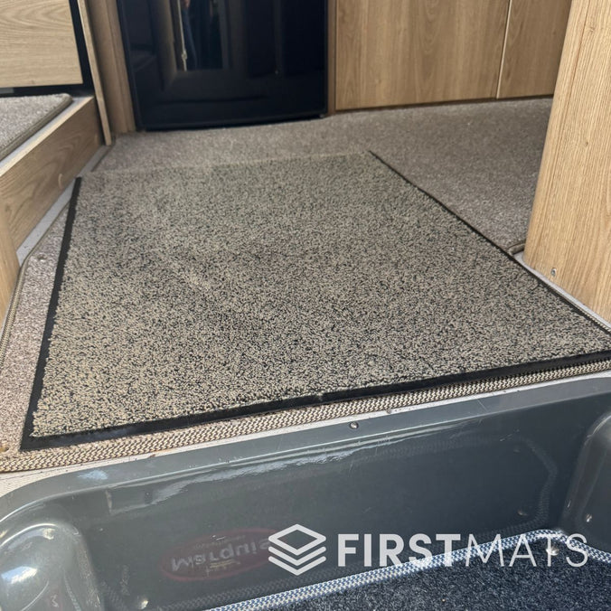 Beige plush mat inside a motorhome