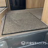 Beige plush mat inside a motorhome