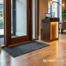Grey made to measure mat in cosy restaurant entrance