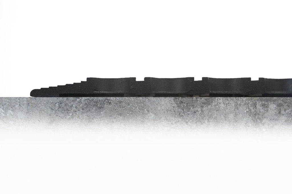 Anti-fatigue industrial mat roll with debris collection