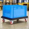 A blue moving dolly in a warehouse