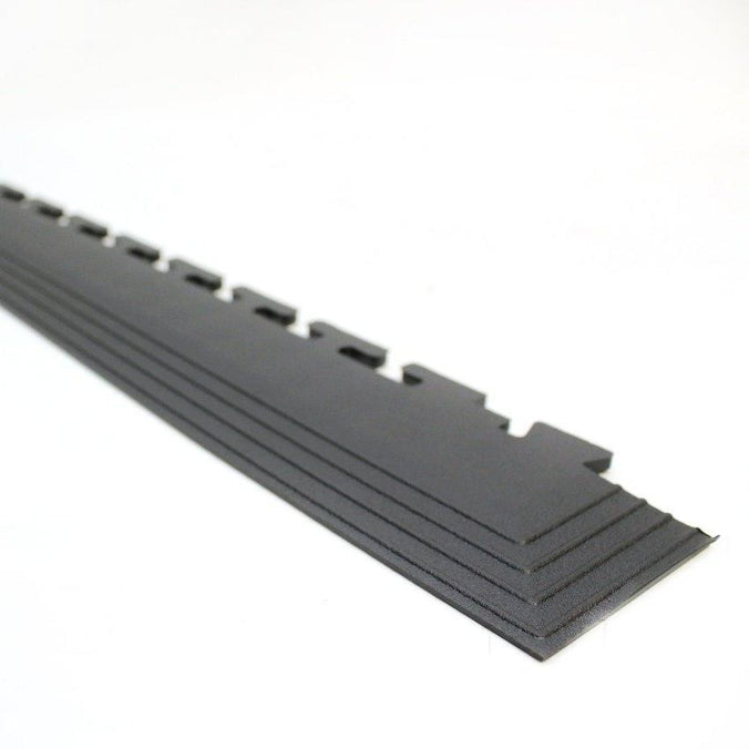 Corner piece for interlocking workshop tiles