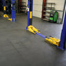 Auto workshop with PVC tiles on floor