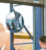 circular indoor and outdoor blind spot mirror being used to check forklift truck outside (4566747545635)