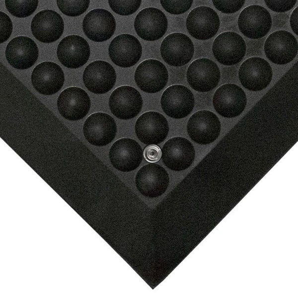 Black PremBubble ESD Anti-Fatigue Floor Mat designed for industrial use with bubble texture for comfort and electrostatic discharge protection.