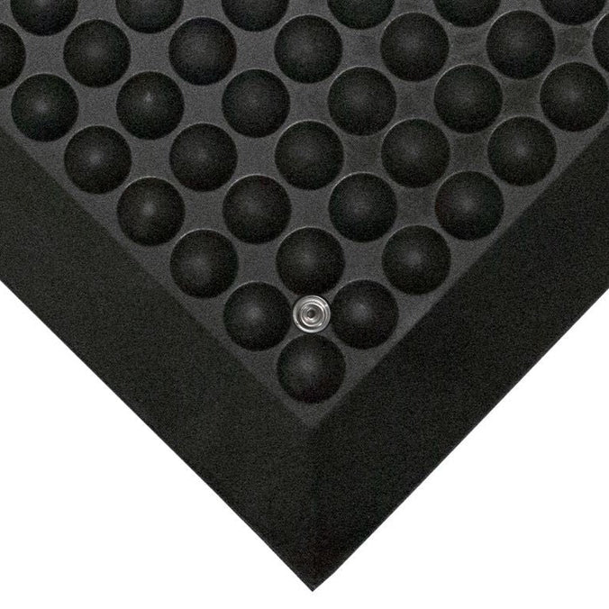 Black PremBubble ESD Anti-Fatigue Floor Mat designed for industrial use with bubble texture for comfort and electrostatic discharge protection.