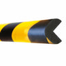 A close-up view of a self-adhesive foam edge protector with black and yellow hazard bands.